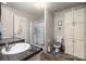 Bathroom features a walk-in shower, ample storage, and a coordinated color scheme at 251 Birch Tree Rd, Clover, SC 29710