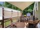 Outdoor deck with wooden chairs, providing an ideal space for relaxing and enjoying the outdoors at 251 Birch Tree Rd, Clover, SC 29710