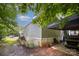 Charming single-story home with light green siding and a well-maintained yard and canopy for vehicle storage at 251 Birch Tree Rd, Clover, SC 29710