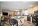 Modern kitchen flows into a living area with fireplace, creating a cozy and inviting open-concept space at 251 Birch Tree Rd, Clover, SC 29710
