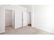Comfortable bedroom with neutral carpeting and two closets, offering ample storage space at 265 Miramar Dr, York, SC 29745