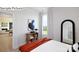 Bright bedroom with modern decor, neutral walls, natural light, and closet access offers comfort and style at 265 Miramar Dr, York, SC 29745