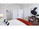 Bright bedroom with modern decor, neutral walls, and closet access offers comfort and style at 265 Miramar Dr, York, SC 29745