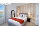 Cozy bedroom with stylish wallpaper, soft lighting, and a comfortable bed, creating a relaxing retreat at 265 Miramar Dr, York, SC 29745