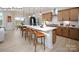 Open concept kitchen with a long island with seating, modern lighting, and views to the outdoors at 265 Miramar Dr, York, SC 29745