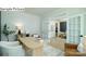 Bright office features French doors, a large desk, and views into the dining and kitchen area at 265 Miramar Dr, York, SC 29745