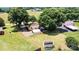 Aerial view of the property with lush green grass and mature trees at 3372 Lee Lawing Rd, Lincolnton, NC 28092