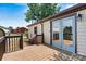 Inviting back porch with a wooden deck and stairs, perfect for outdoor relaxation at 3372 Lee Lawing Rd, Lincolnton, NC 28092