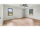 Bedroom with two windows and wood-look flooring at 3372 Lee Lawing Rd, Lincolnton, NC 28092
