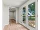 Hallway with french doors leading to a deck with lawn views at 3372 Lee Lawing Rd, Lincolnton, NC 28092
