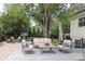 Inviting back deck with comfortable seating and lush greenery, perfect for outdoor relaxation at 4126 Tyndale Ave, Charlotte, NC 28210