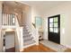Open foyer featuring hardwood floors, staircase, and an inviting entrance at 4126 Tyndale Ave, Charlotte, NC 28210