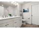 Bright bathroom featuring double sinks and a large mirror at 4209 Grier St, Gastonia, NC 28056