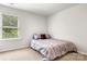 Bedroom featuring neutral walls, a window, and a bed at 4209 Grier St, Gastonia, NC 28056