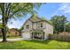 This inviting two-story home features a covered front porch, 2-car garage, and landscaped yard at 4209 Grier St, Gastonia, NC 28056