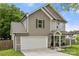 Two-story house with two-car garage, covered front porch, and manicured lawn at 4209 Grier St, Gastonia, NC 28056