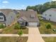 Charming home featuring a two-car garage and manicured lawn in a well-maintained neighborhood at 4427 Poplin Grove Dr, Indian Trail, NC 28079