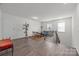 Second story loft area with lots of natural light and wood floors at 4427 Poplin Grove Dr, Indian Trail, NC 28079