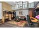Finished basement with cozy seating area, workspace, and unique ceiling feature at 4439 Brandie Glen Rd, Charlotte, NC 28269