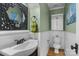 Elegant half bathroom features ornate mirror, stylish sink, and modern fixtures at 4439 Brandie Glen Rd, Charlotte, NC 28269