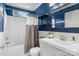 Bathroom featuring a tub and shower combination and custom shelving at 4439 Brandie Glen Rd, Charlotte, NC 28269