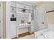 Bedroom with built-in vanity, shelving, and makeup mirror at 4439 Brandie Glen Rd, Charlotte, NC 28269
