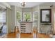 Charming breakfast nook featuring a cozy island, bar stools, and bright windows, creating a perfect spot for casual dining at 4439 Brandie Glen Rd, Charlotte, NC 28269