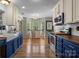 Bright kitchen featuring a breakfast nook, stylish cabinetry, and stainless-steel appliances for cooking and entertaining at 4439 Brandie Glen Rd, Charlotte, NC 28269
