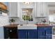 Stylish kitchen sink with subway tile backsplash, wood countertops, and modern fixtures at 4439 Brandie Glen Rd, Charlotte, NC 28269