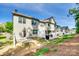 Rear exterior view of a townhome with a fenced patio at 5033 Mockernut Ln, Indian Land, SC 29707