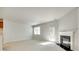 Bright living room with fireplace and ample natural light at 5033 Mockernut Ln, Indian Land, SC 29707