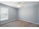 Bedroom with neutral walls, carpeted floor, and window at 7442 Sparkleberry Dr, Indian Trail, NC 28079