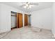 This spacious bedroom with closet and ceiling fan awaits personalized touches and upgrades at 7501 Glencannon Dr, Charlotte, NC 28227