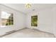 Bright bedroom with dual windows, offering plenty of natural light at 7501 Glencannon Dr, Charlotte, NC 28227