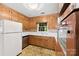 Kitchen with classic cabinets, neutral countertops, and ample counter space at 7501 Glencannon Dr, Charlotte, NC 28227