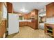 Functional kitchen with classic cabinets, neutral countertops, and essential appliances at 7501 Glencannon Dr, Charlotte, NC 28227