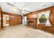 Inviting living area with a classic brick fireplace and charming wood accents at 7501 Glencannon Dr, Charlotte, NC 28227