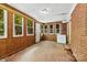 Bright sunroom with large windows providing ample natural light and outdoor views at 7501 Glencannon Dr, Charlotte, NC 28227