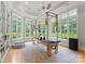 Bright exercise room with pilates machine, large windows, and ceiling fan at 8500 Longview Club Dr, Waxhaw, NC 28173