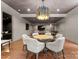Finished basement with game table, accent lighting and view into media space at 8500 Longview Club Dr, Waxhaw, NC 28173