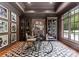 Modern office with custom built-ins and contemporary desk overlooking pool at 8500 Longview Club Dr, Waxhaw, NC 28173