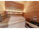 Beautiful home sauna with wooden benches and walls, plus built in heater at 8500 Longview Club Dr, Waxhaw, NC 28173