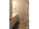 Well-lit bathroom with a single sink vanity, neutral walls, and tile flooring at 858 Oak Manor Se Dr, Concord, NC 28025