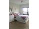 Charming bedroom featuring pink accents, a full sized bed, and ample storage space at 858 Oak Manor Se Dr, Concord, NC 28025