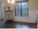 Dining room features include modern trim work and dark laminate flooring at 858 Oak Manor Se Dr, Concord, NC 28025