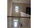 Entryway showcases a hanging light fixture and a clear view to the main entry door at 858 Oak Manor Se Dr, Concord, NC 28025