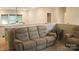 Bright loft area features neutral-toned seating arrangements, perfect for relaxation and entertainment at 858 Oak Manor Se Dr, Concord, NC 28025