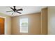 Bedroom features neutral walls, carpet, ceiling fan and window with blind at 8604 Rockmoor Ridge Rd, Charlotte, NC 28215
