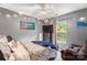Comfortable bedroom featuring a cozy chair, dresser, and decorative lighting accents at 9236 Clifton Meadow Dr, Matthews, NC 28105