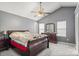 Primary bedroom boasts vaulted ceilings, ceiling fan, and ample natural light at 9236 Clifton Meadow Dr, Matthews, NC 28105